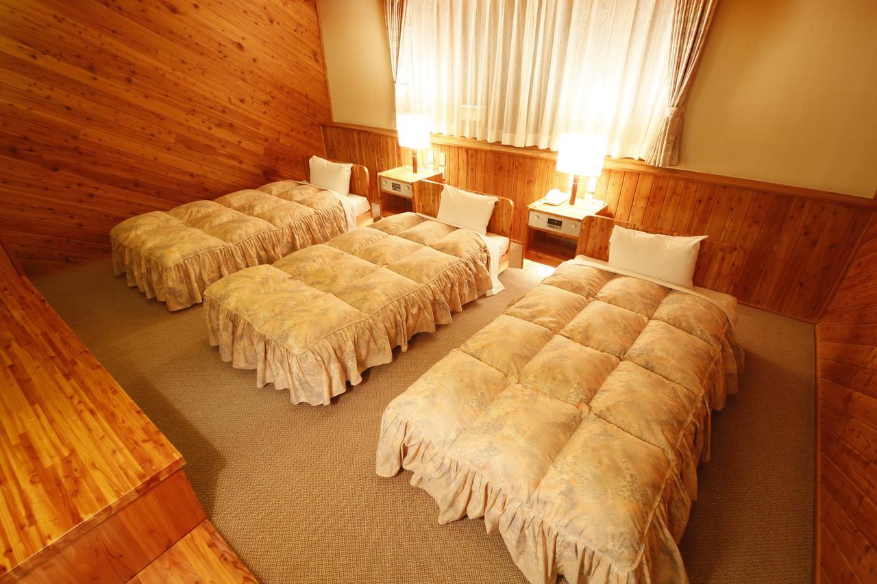 Log Hotel Larch Lake Kanayama Minamifurano Habitación foto