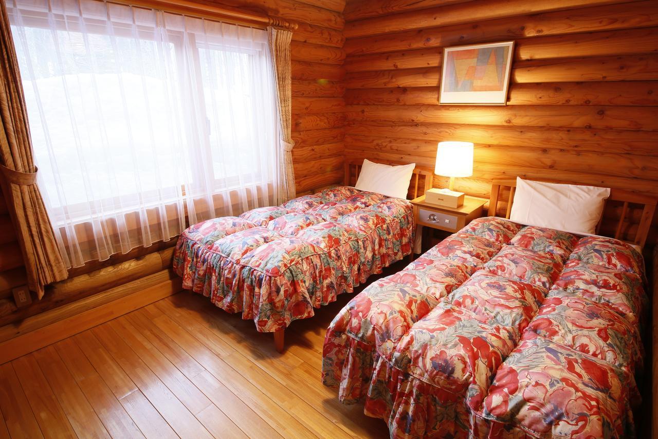 Log Hotel Larch Lake Kanayama Minamifurano Habitación foto