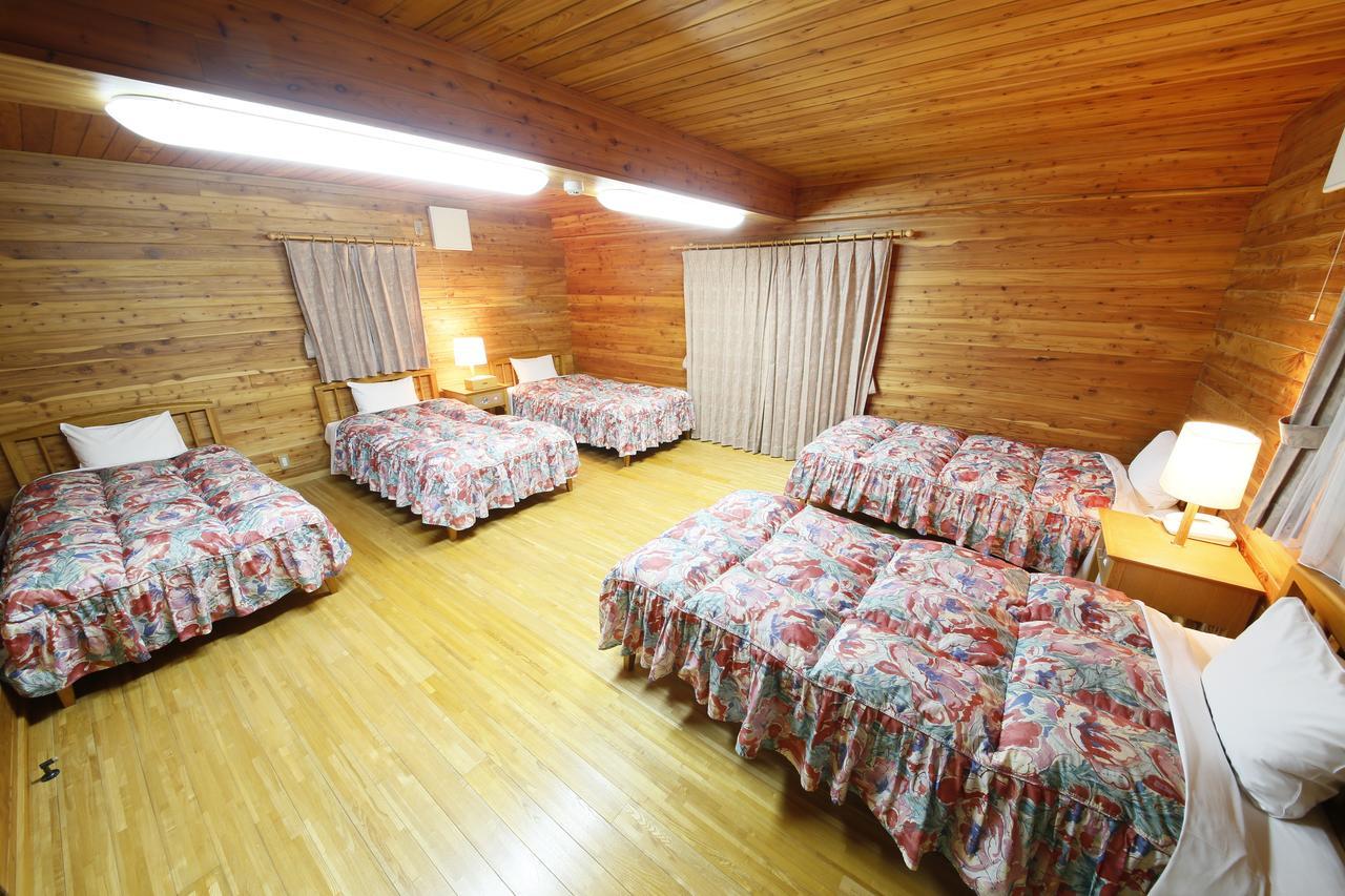 Log Hotel Larch Lake Kanayama Minamifurano Habitación foto
