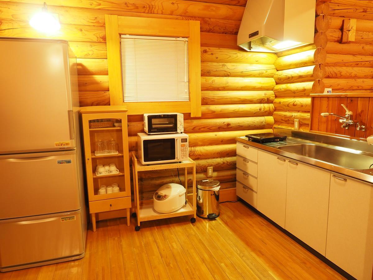 Log Hotel Larch Lake Kanayama Minamifurano Habitación foto