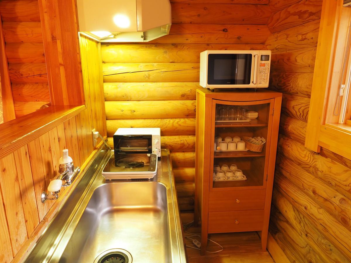 Log Hotel Larch Lake Kanayama Minamifurano Habitación foto