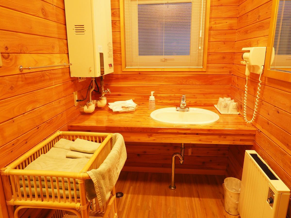 Log Hotel Larch Lake Kanayama Minamifurano Habitación foto