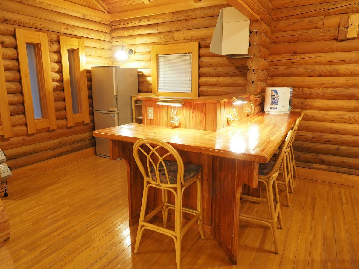 Log Hotel Larch Lake Kanayama Minamifurano Habitación foto