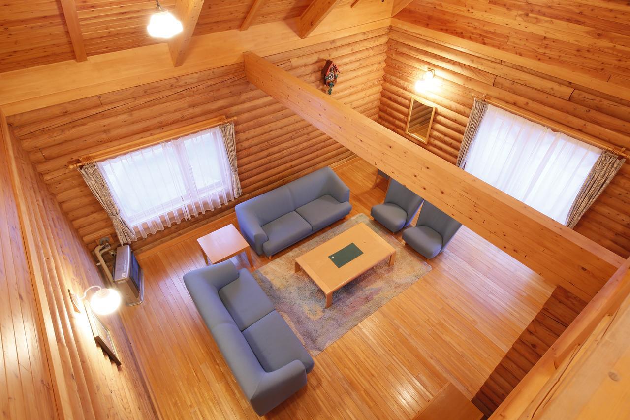 Log Hotel Larch Lake Kanayama Minamifurano Habitación foto